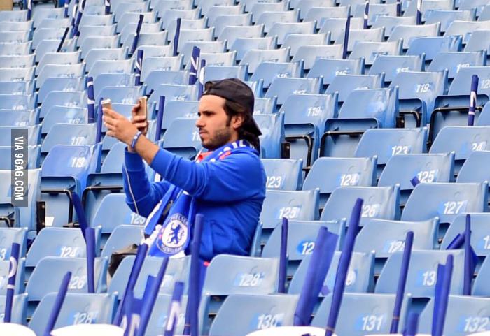 Chelsea fan taking a selfie of himself taking a selfie.