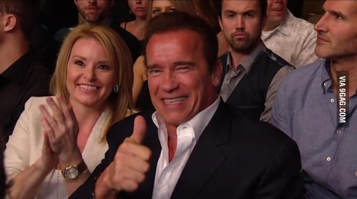 Noticed this involuntary photobomb when Arnold Schwarzenegger was in picture during UFC 187. Hilarious!