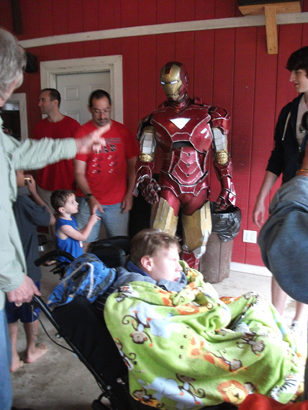 This Guy Dressed As Iron Man Attends A Charity For Kids With Disabilities Every Year. His Story Is Beautiful