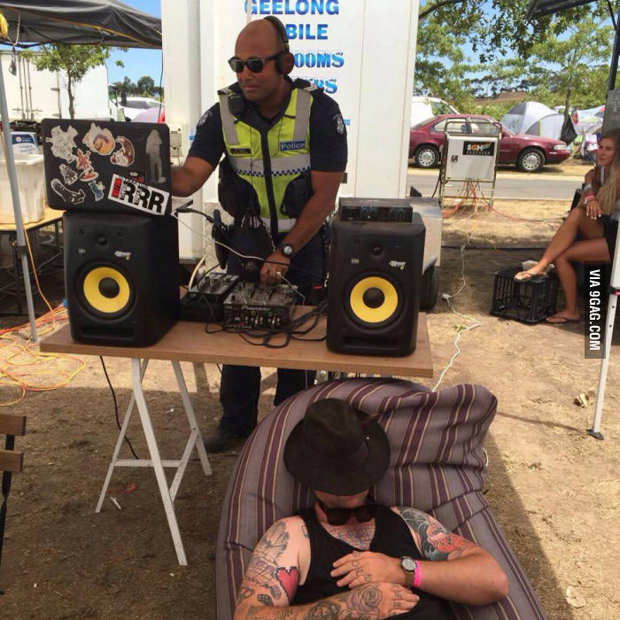 Policeman replacing the asleep DJ at Falls Festival, Australia