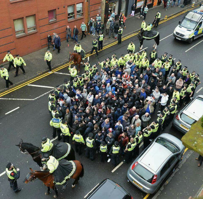 Rangers fans being escorted to Celtics stadium. Absolute scenes!