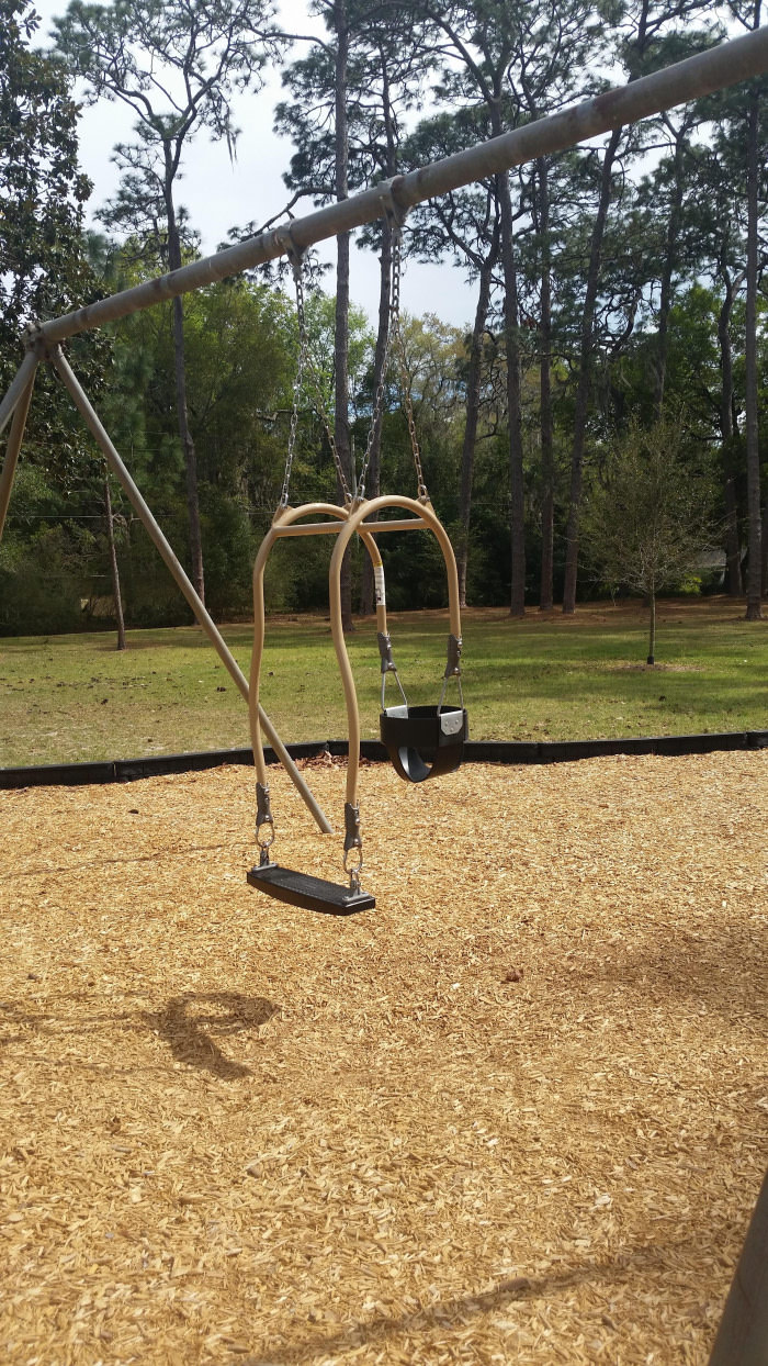 This swing is designed so that the kid and the parent can swing together.