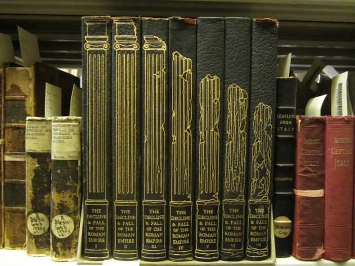 &quot;The decline and fall of the Roman Empire&quot; book set. Each volume has a progressively decayed pillar.