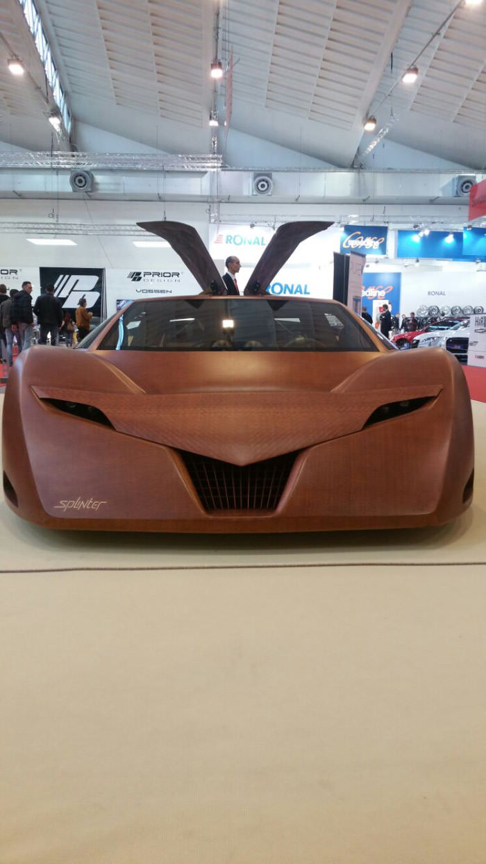 A car entirely made out of wood.