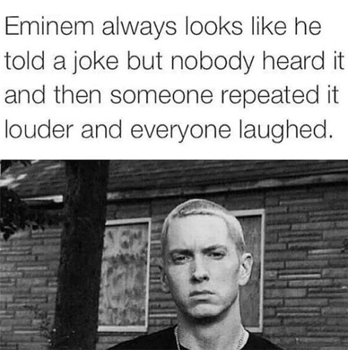 Eminem always looks like he told a joke