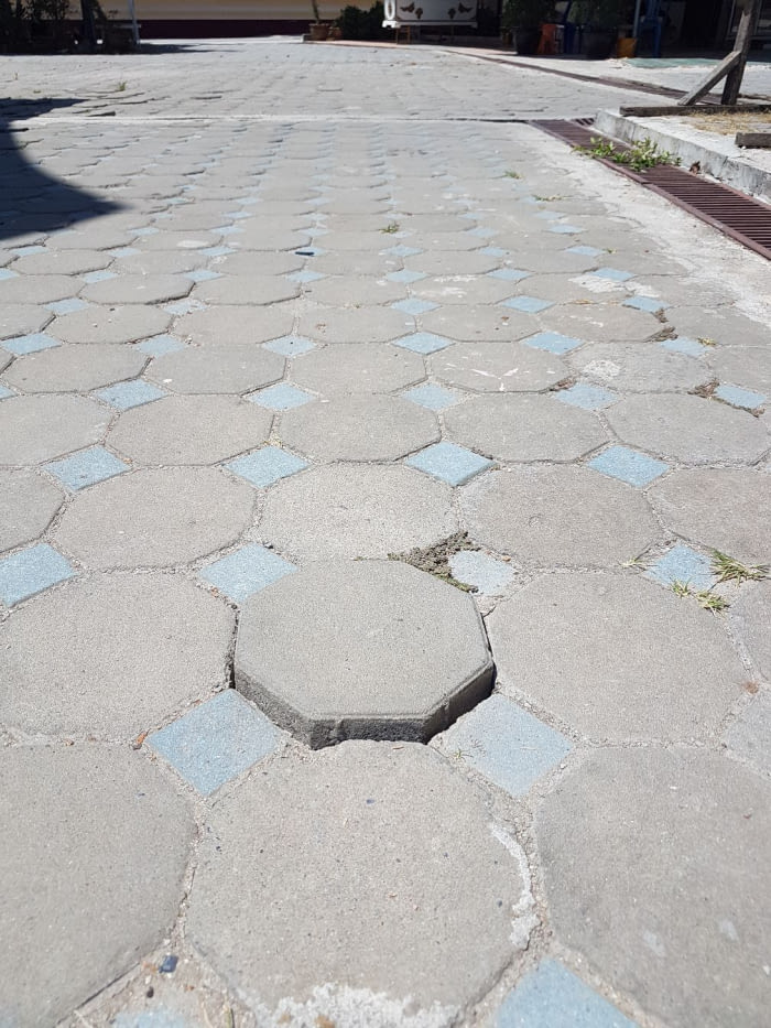 Walking on the street when suddenly... will it trigger a trap or open a hidden door?